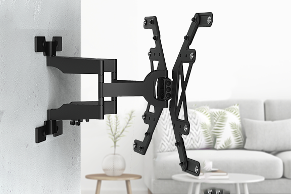 The extra-flat, swivel and tilt Hama TV wall mount is mounted on a wall, with a living room in the background